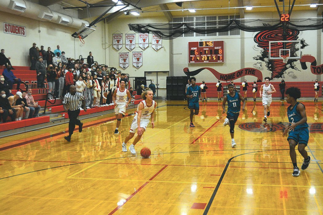The Yelm Tornados’ offense leads a fastbreak in the first quarter against Spanaway Lake in this file photo.